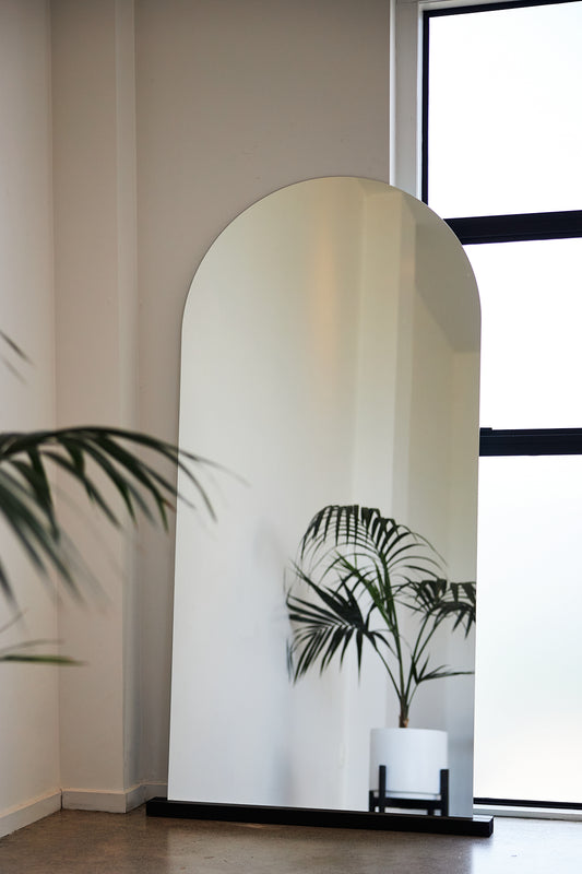 Frameless arch mirror