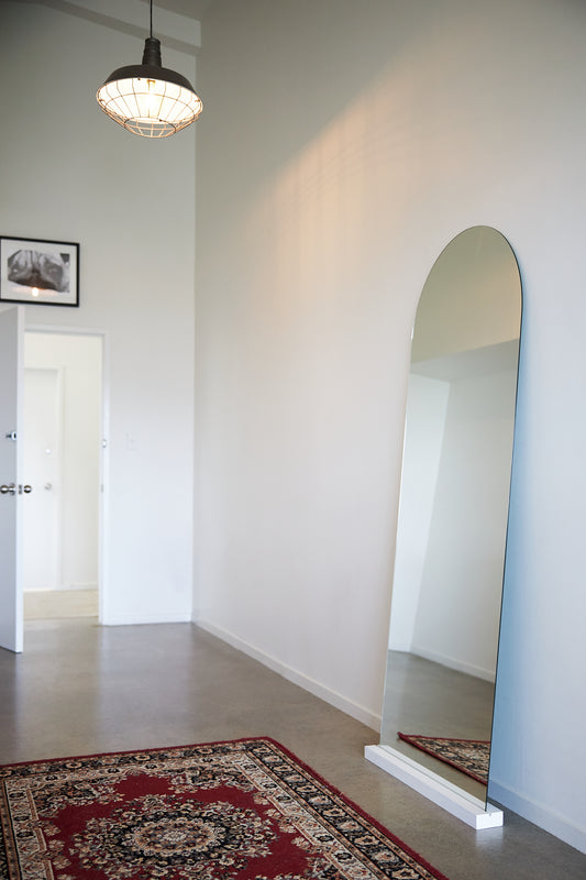 Frameless arch mirror